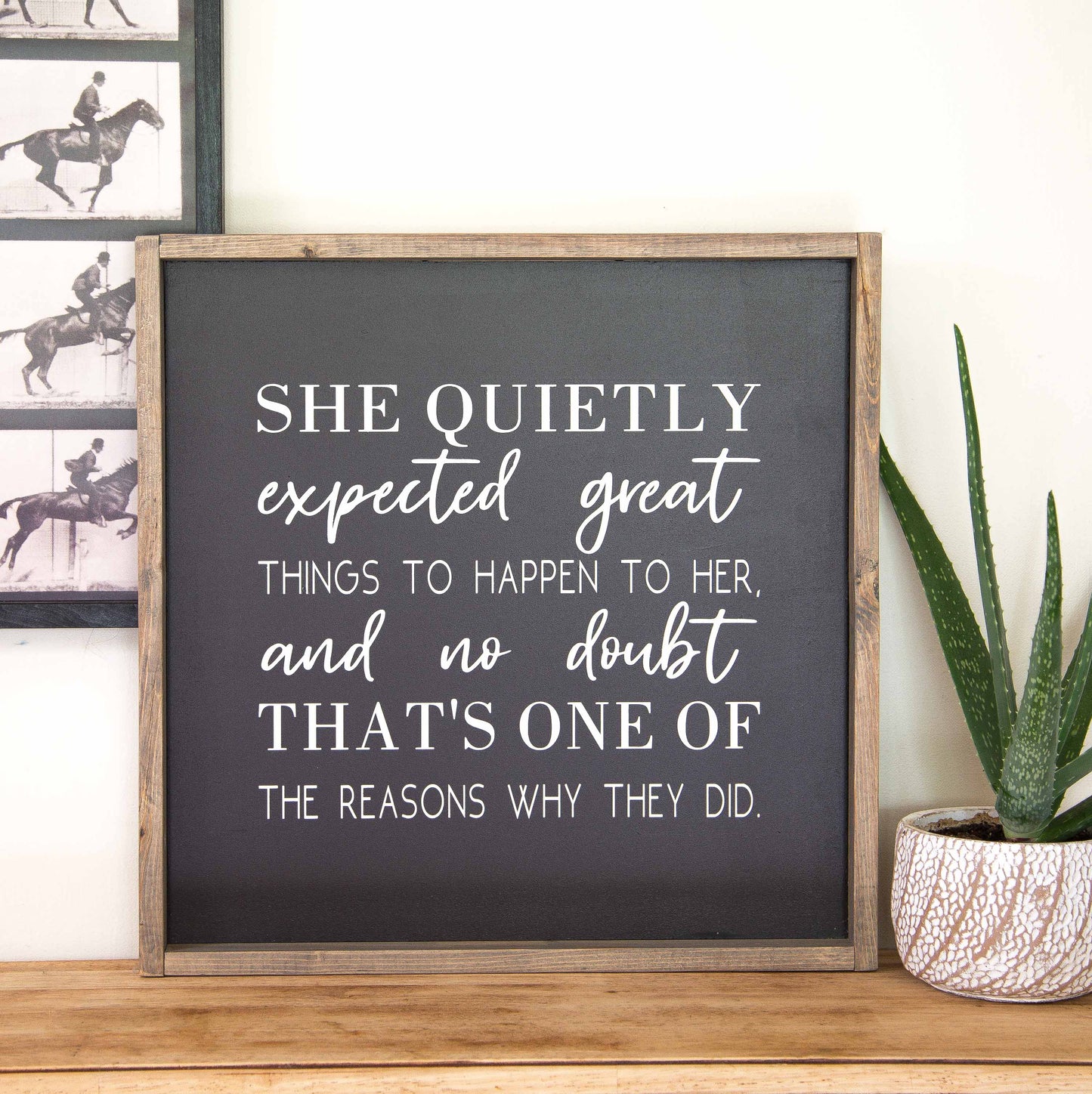 She quietly expected wood sign